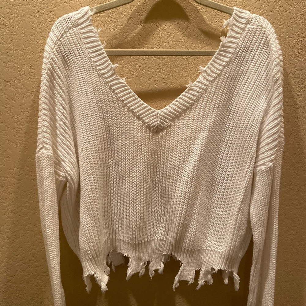 White distressed sweater